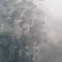 Texture astratta grigia con schizzi e sfumature